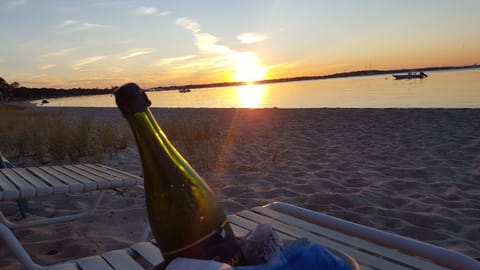 On the beach, sun loungers, beach towels