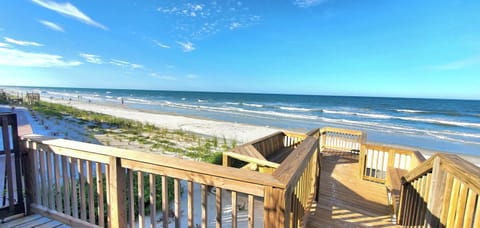 On the beach, sun loungers, beach towels