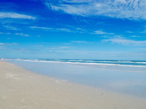 On the beach, sun loungers, beach towels