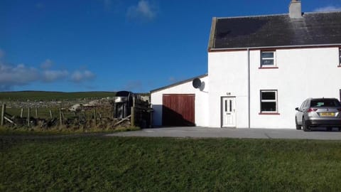 parking at front of cottage