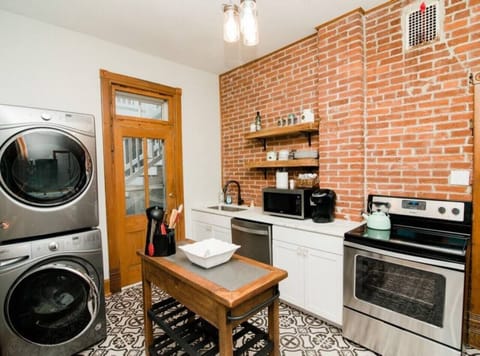 Fridge, stovetop, dishwasher, coffee/tea maker