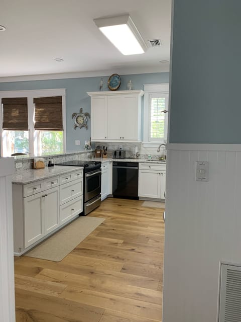 The kitchen is open with room for more than 1 cook.