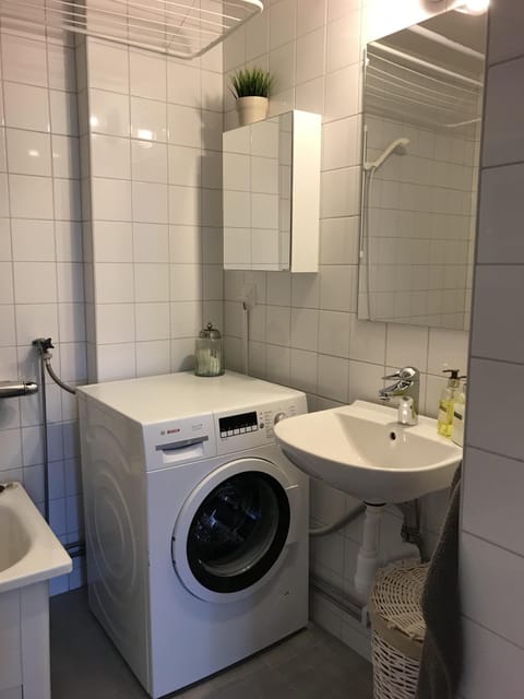 Combined shower/tub, hair dryer, towels, soap