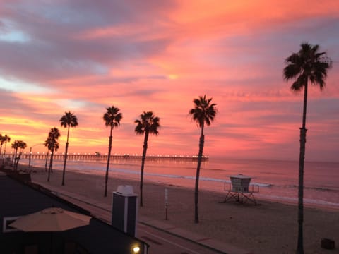 Sunrise reflection over the pier from the balcony