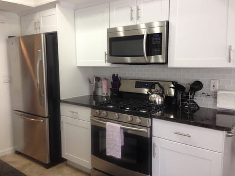 Newly remodeled kitchen with stainless steel appliances 