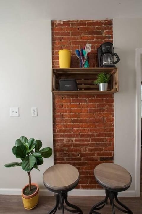 Fully equipped kitchen with toaster oven, coffee maker and utensils