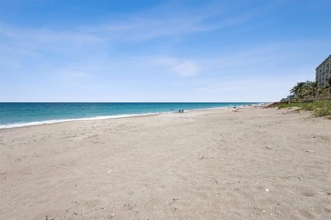 On the beach, sun loungers, beach towels