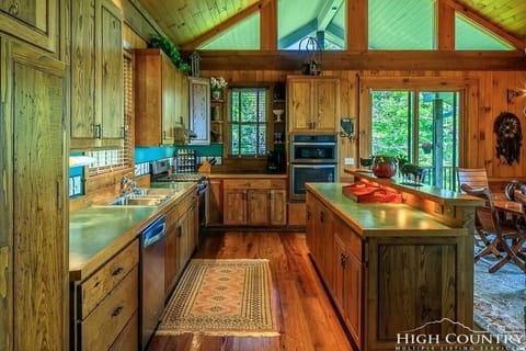 Gourmet kitchen with beautiful chestnut cabinets