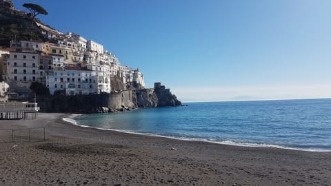 On the beach, sun loungers, beach towels