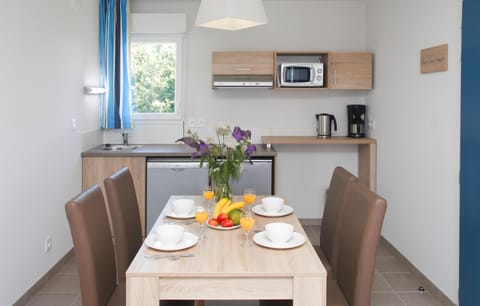 Settle into the dining area and enjoy a nice meal.