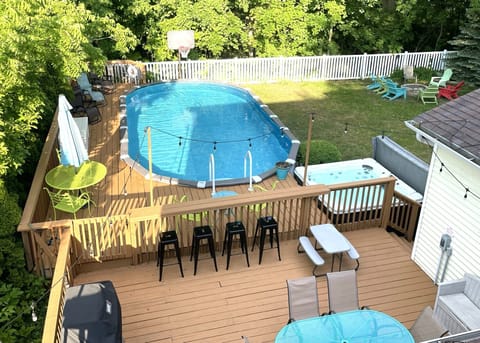 Yard has it all...large heated pool, large deck, hot tub, beautiful landscaping