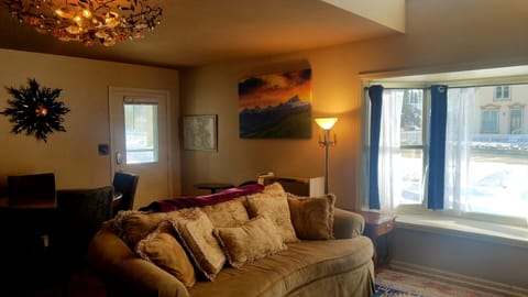 Front door and large bay window overlooking Gunnison Ave.