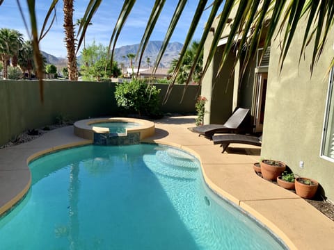 A heated pool, sun loungers