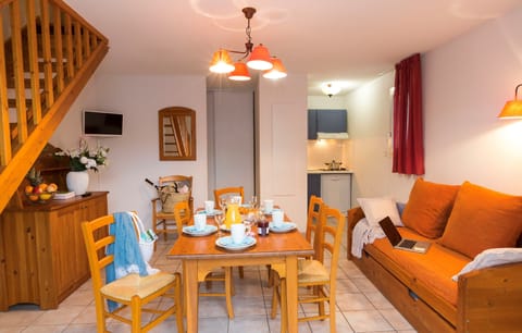 Relax in the gorgeous open-concept living space which adjoins with the dining area.