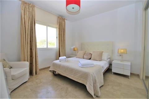 Master bedroom with air conditioning and en-suite bathroom