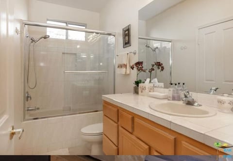 Combined shower/tub, hair dryer, towels, soap