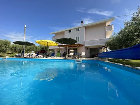 Pool | Outdoor pool, a heated pool, pool umbrellas, sun loungers