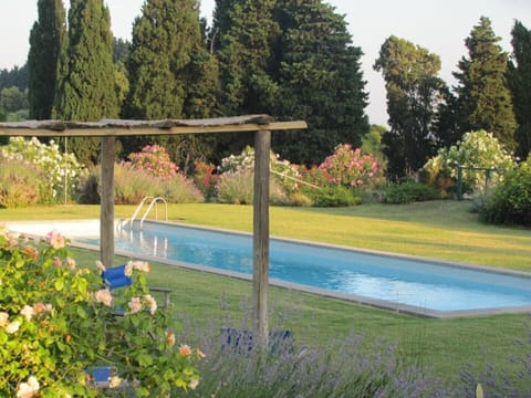 The pool area is fenced