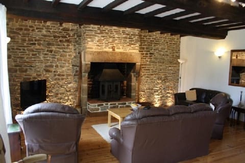 Spacious Living Room with exposed wall, authentic beams and Log burner