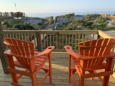 relax on this large outside deck only steps from private beach!