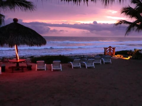 On the beach, sun loungers, beach towels