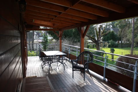 Large pergola, view on gardens. For outdoors sheltered dinners