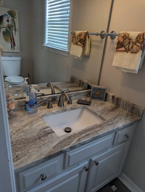 Bathtub, jetted tub, hair dryer, towels