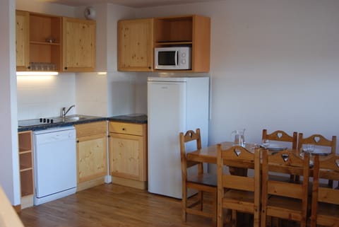 Prepare a meal in the equipped kitchen.