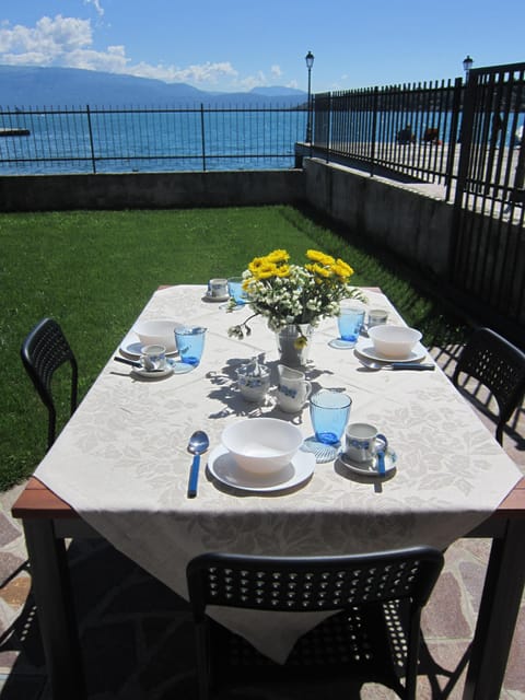 Outside of the apartment with a garden