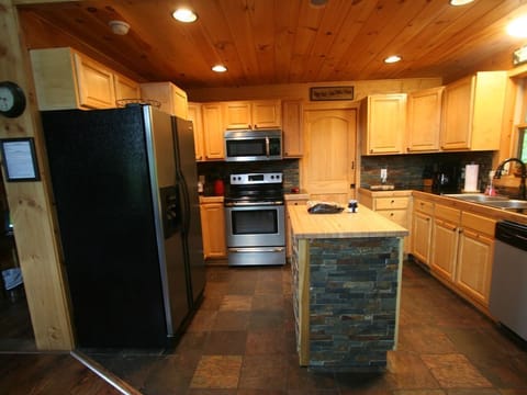 All cooking and kitchen utensils provided. Dishwasher, Keurig and coffee maker.