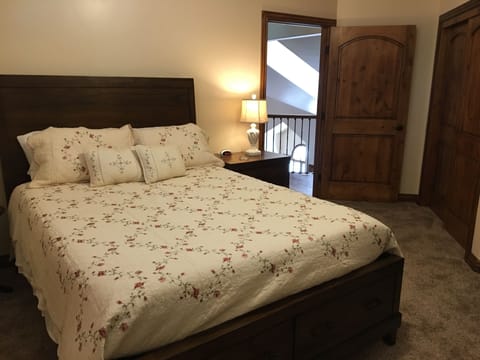 Upstairs bedroom with queen bed