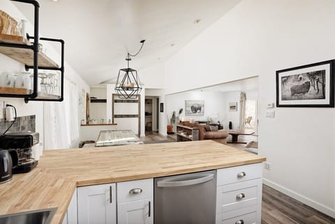 Spacious and open-concept kitchen, living, and dining area