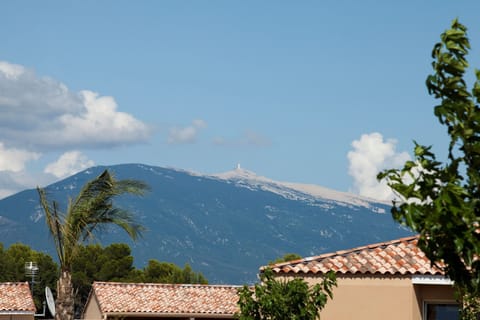 Picturesque views of the mountain massif in the distance.