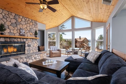 High end furnishings, beautiful stone fireplace  and a view second to none!
