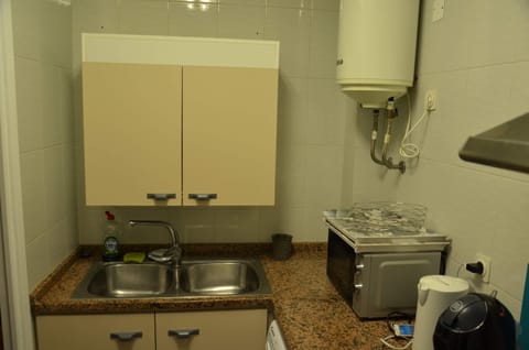 Fridge, microwave, coffee/tea maker, electric kettle