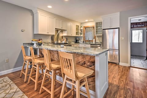 Fridge, stovetop, dishwasher, coffee/tea maker