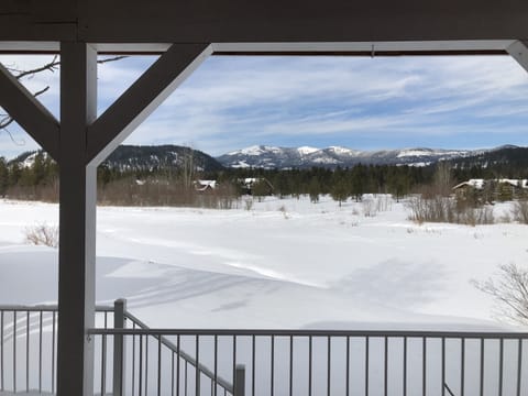 Winter time view of Selkirk Mountains from the deck. 