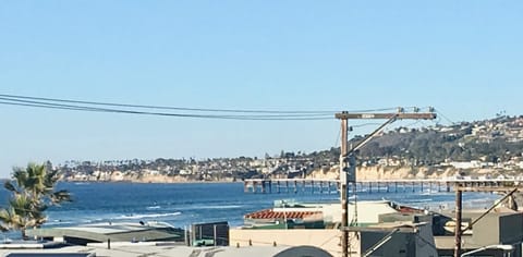 Views up the beach to the north from the walkway to the condo