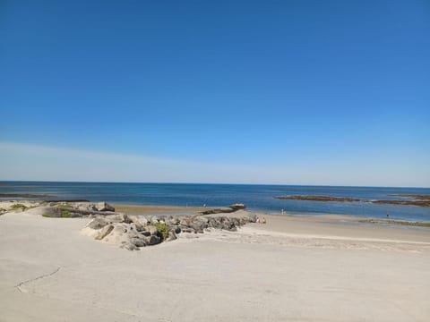 On the beach, sun loungers