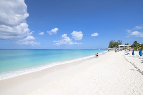 On the beach, sun loungers, beach towels