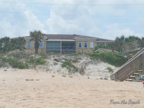 On the beach, sun loungers, beach towels