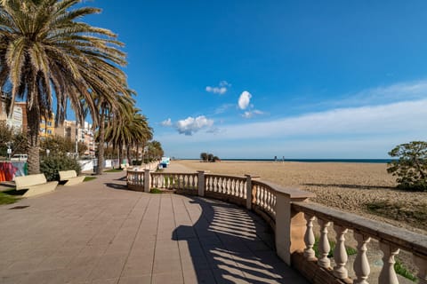 On the beach, sun loungers