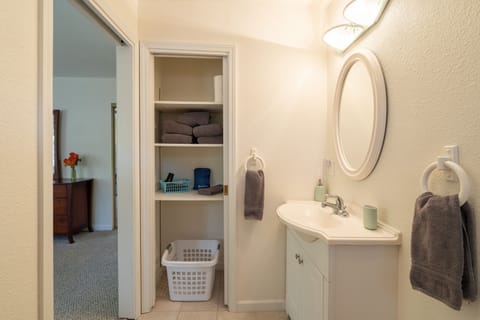 Combined shower/tub, hair dryer, towels, soap