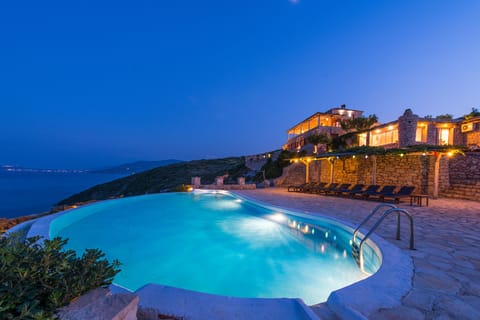 An infinity pool, sun loungers