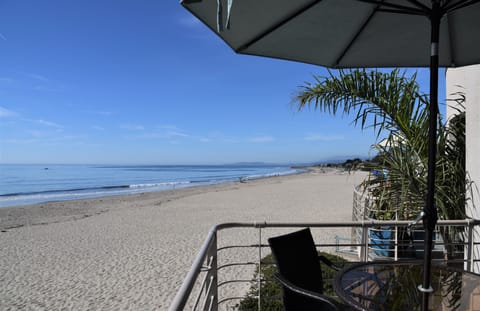 On the beach, sun loungers, beach towels