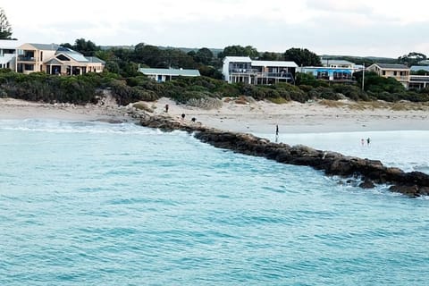 On the beach, sun loungers, beach towels