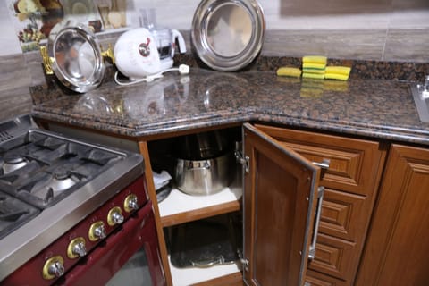 Microwave, coffee/tea maker, cookware/dishes/utensils, paper towels