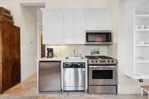 Kitchen - Featuring a Gas Range, Fridge & Dishwasher