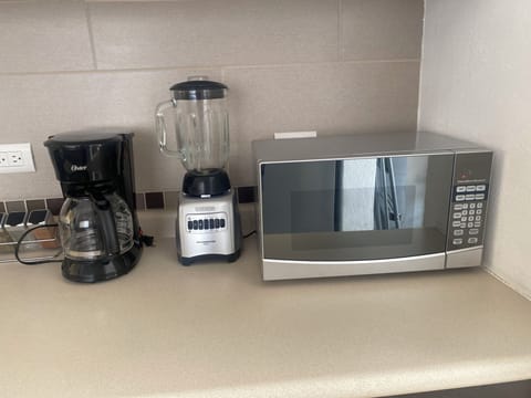 Microwave, coffee/tea maker, cookware/dishes/utensils