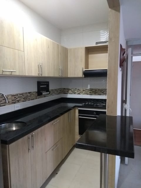 Fridge, oven, stovetop, dining tables